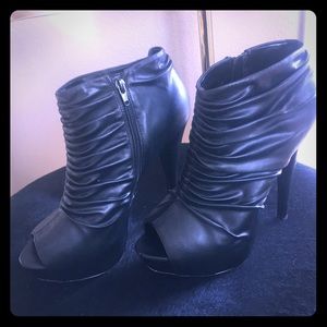 Steve Madden peep toe ruched leather bootie.